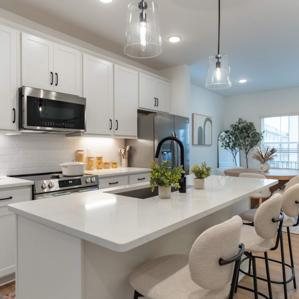 Modern Kitchen with Breakfast Bar at One West End in Charlotte, North Carolina