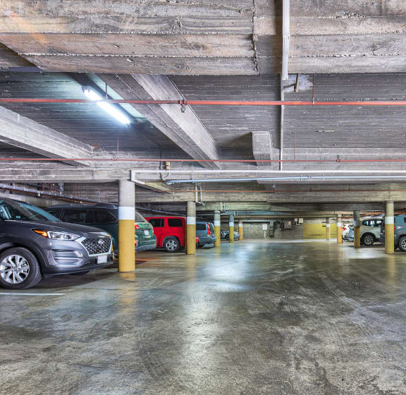 a parking garage with cars parked in it