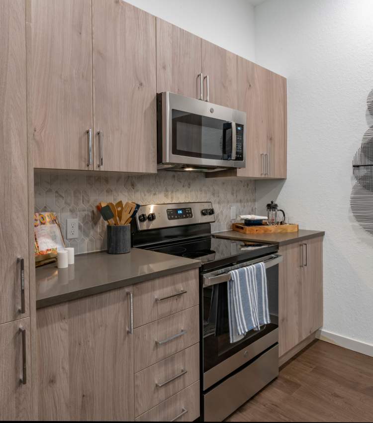 Stainless-steel appliances in an apartment at Avila in Oviedo, Florida