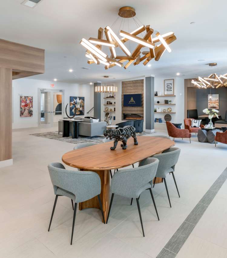 Modern light fixture above a table in the clubhouse at Avila in Oviedo, Florida