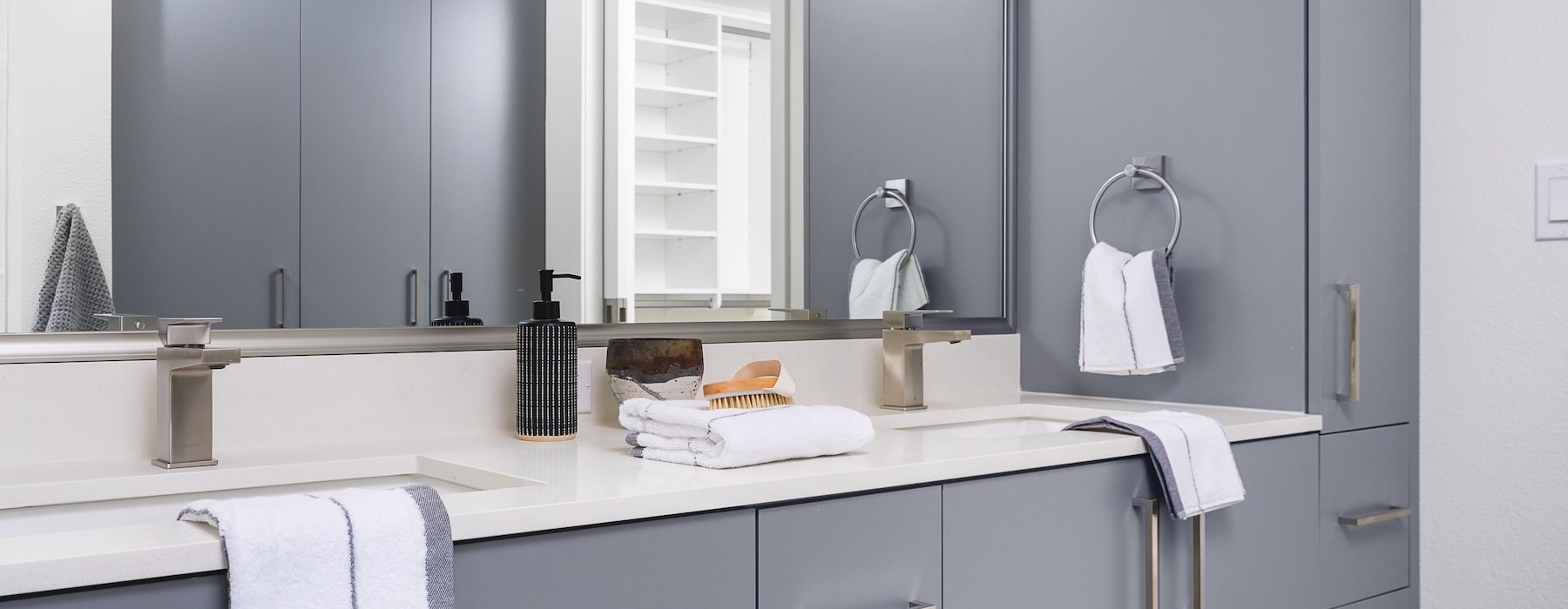 a bathroom with a large mirror