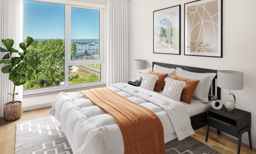 bedroom with bed ceiling plant  windows and lamps