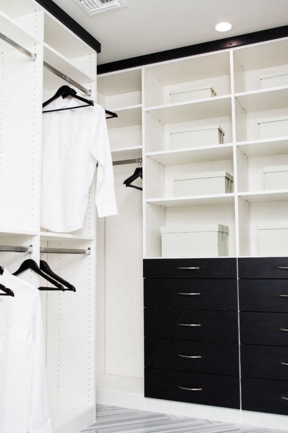 a large closet with black drawers and white closets at Novella Arcadia, Phoenix, 85018