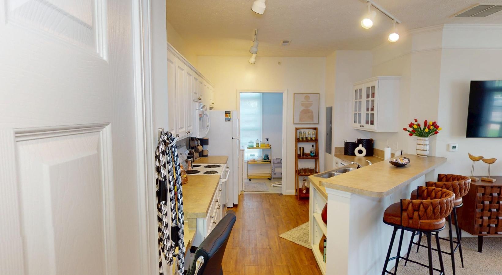 a kitchen with a dining table
