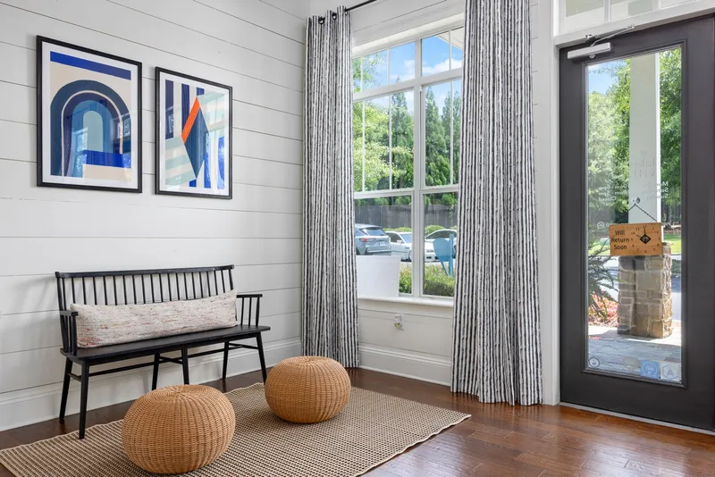 Community lobby area with window and bench