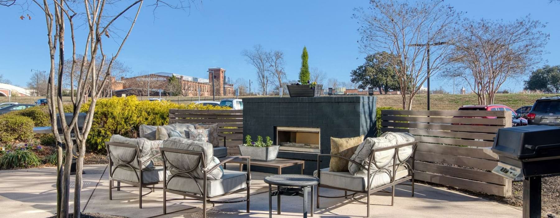 an outdoor fireplace with ample seating