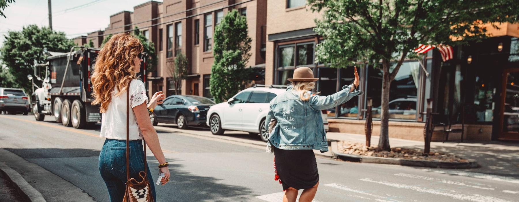Aspire Midtown Luxury Nashville Apartments | two women crossing a street