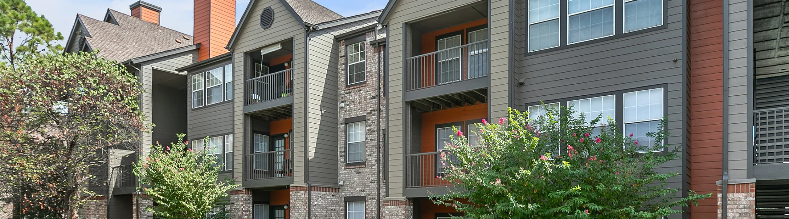 stylish apartment buildings with beautiful landscaping