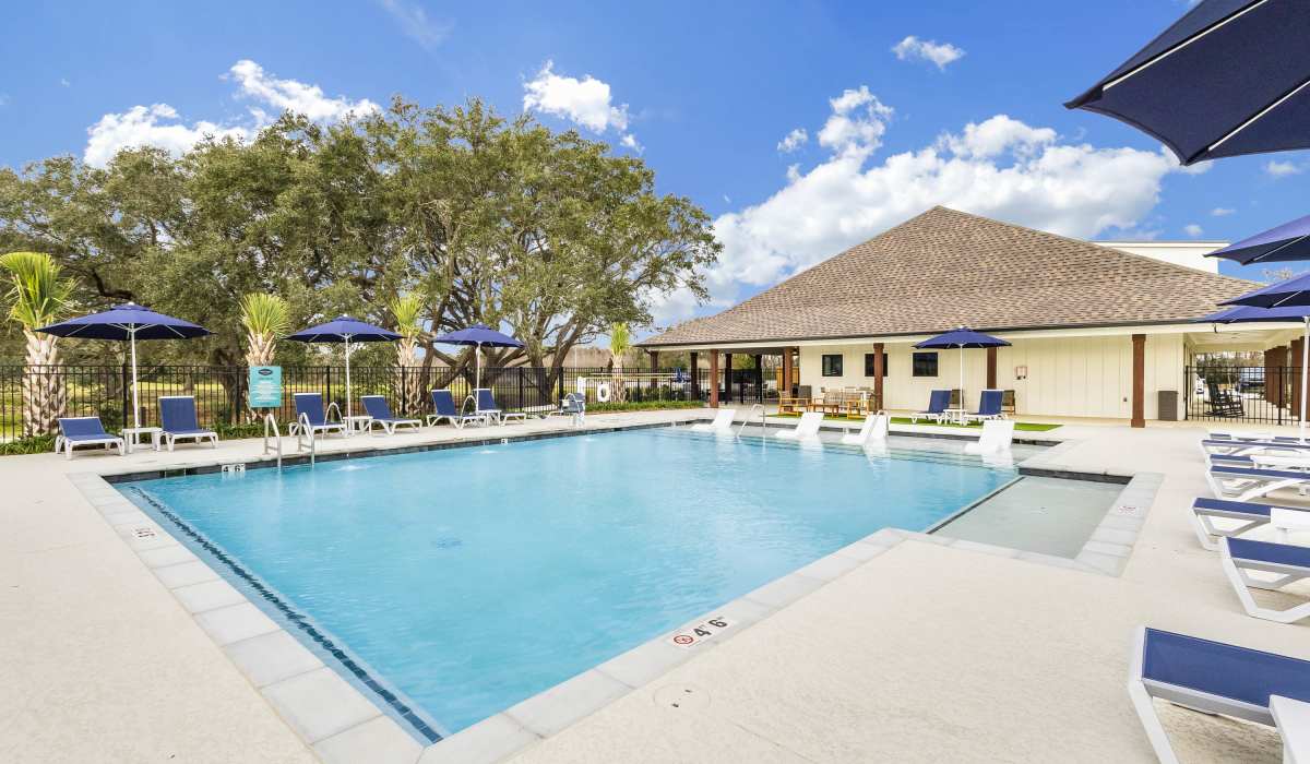 Large resort-style swimming pool at Cottages at Creekview in Lafayette, Louisiana
