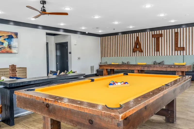 Indoor Community area with pool table and vibrant decor