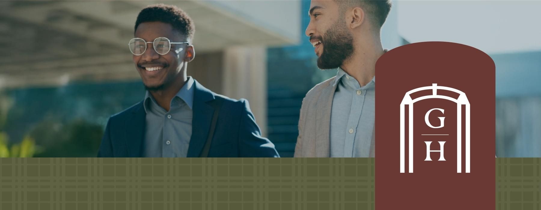 a couple of men smiling