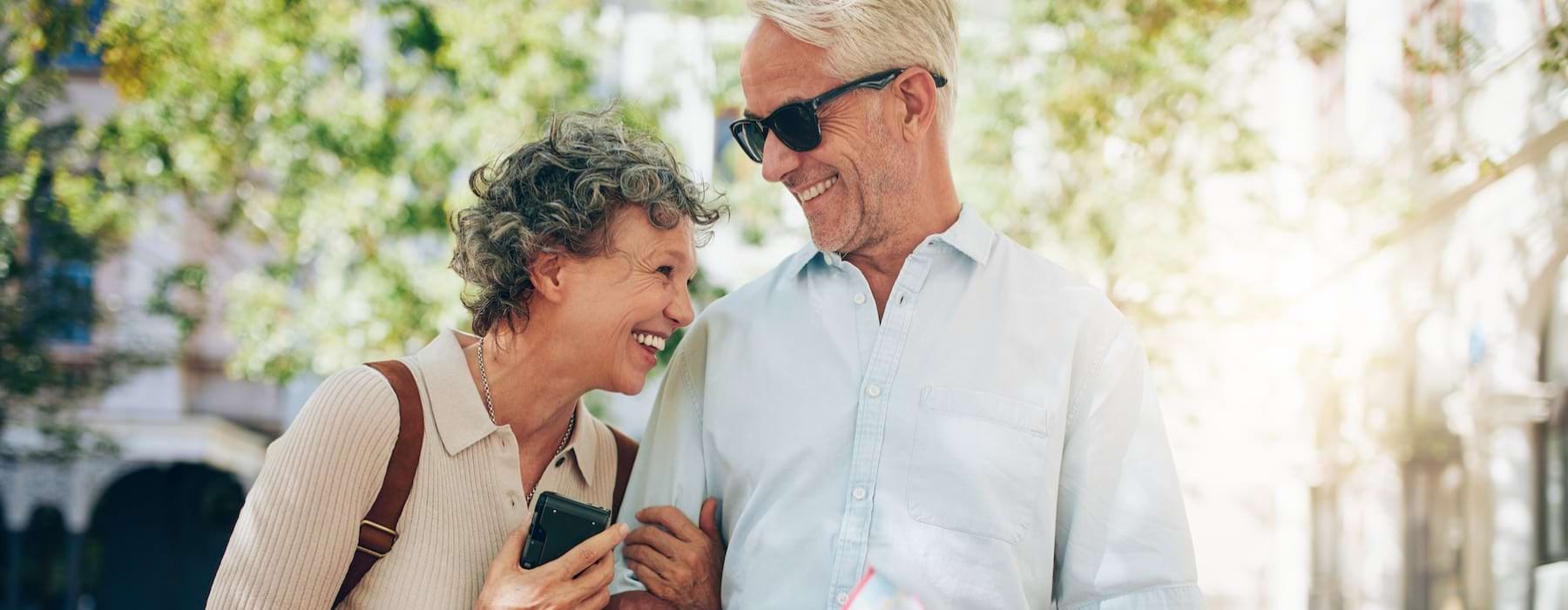 Two people smiling outdoors at Maret Cove houses for rent near Pooler, GA.