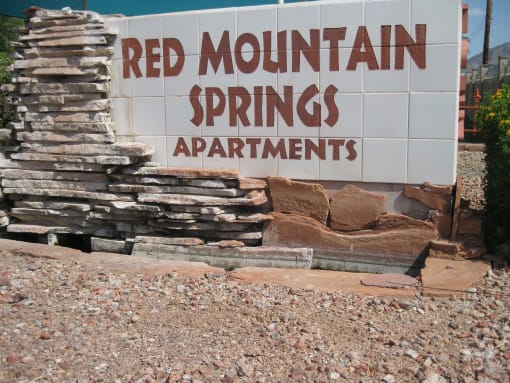 a sign for red mountain springs apartments