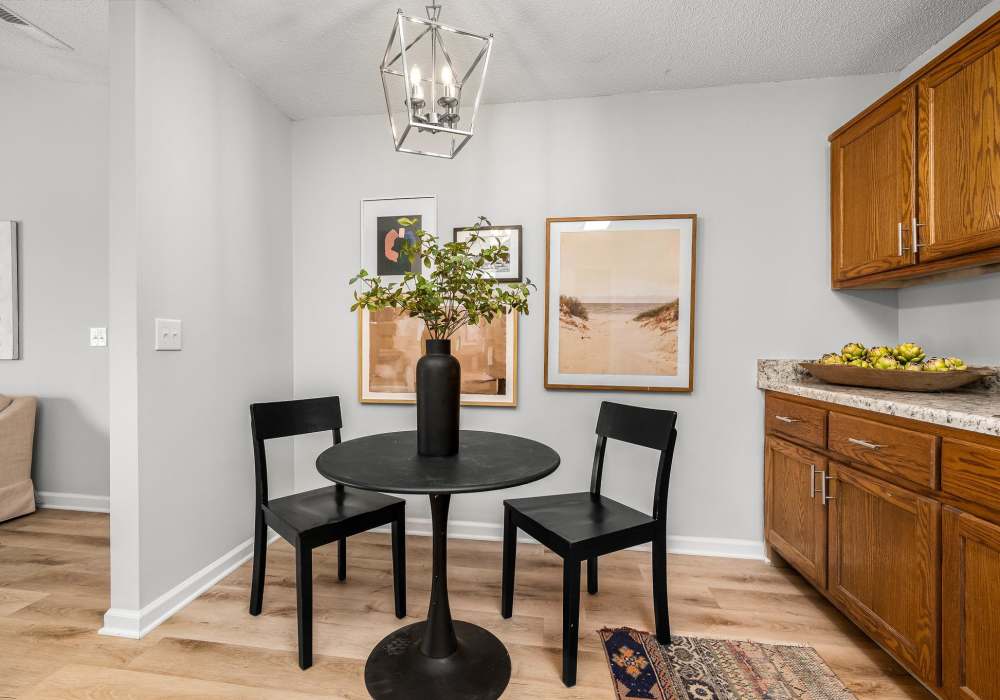 Two-seater black dining table at Saddlebrook Apartments in Murfreesboro, Tennessee