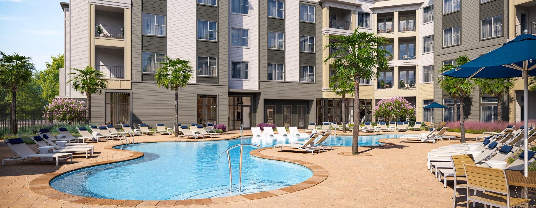 a swimming pool in front of a building