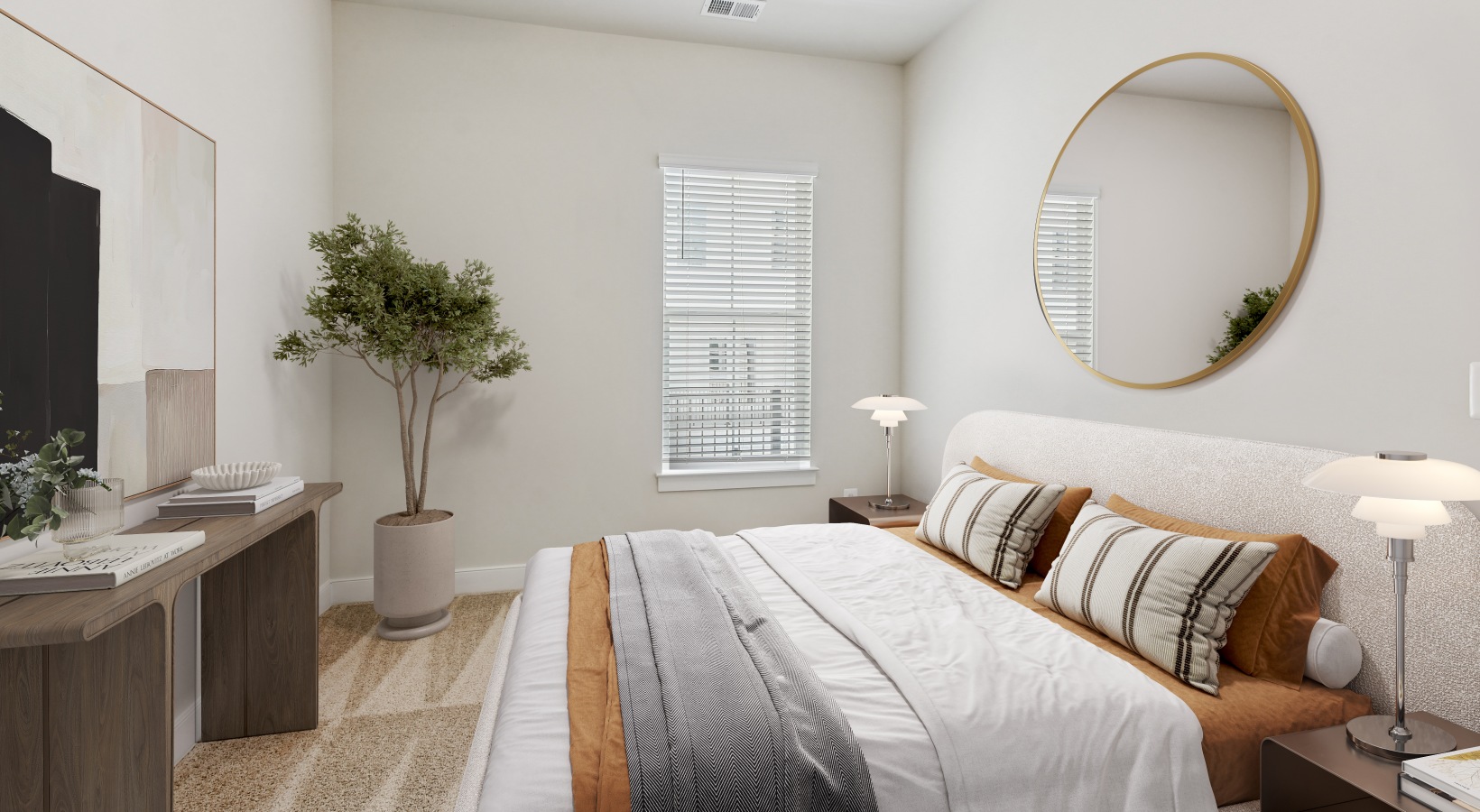 bedroom with bed, round mirror and a plant