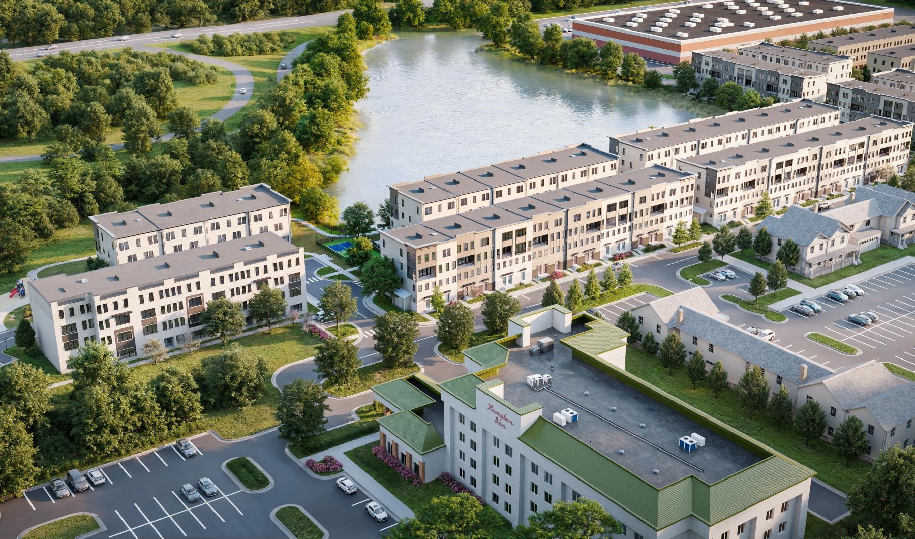 a lake with buildings and trees