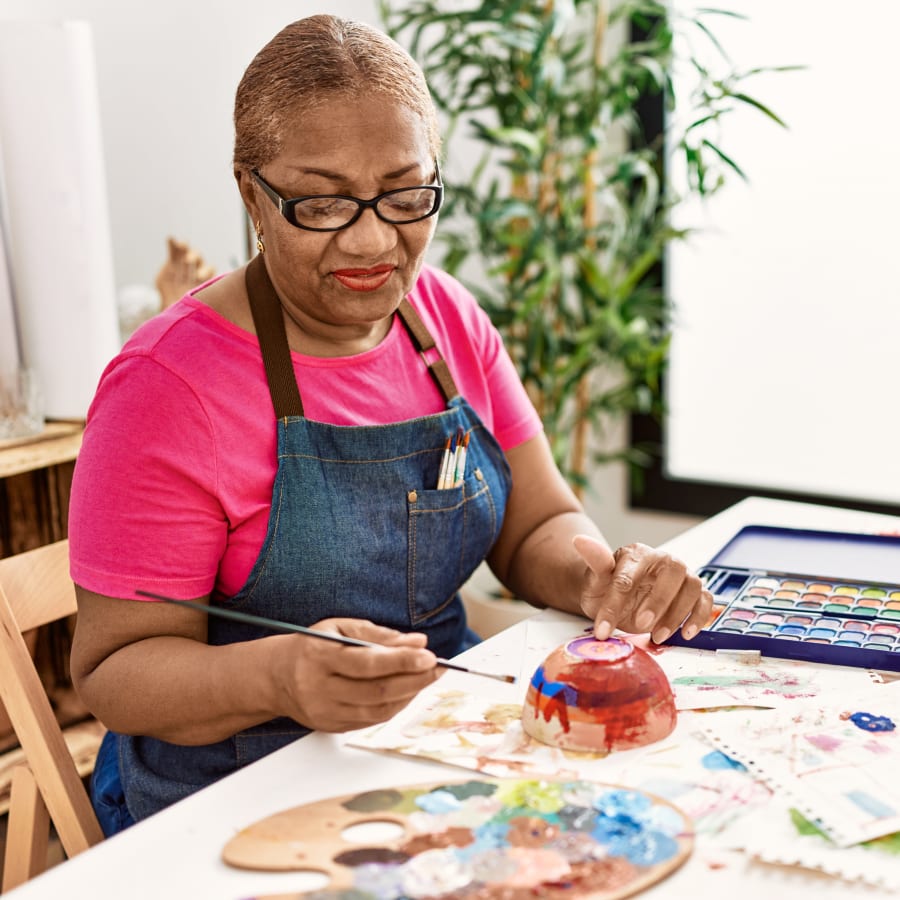 Residents painting/arts and crafts at Gilfield Park in Charlotte, North Carolina