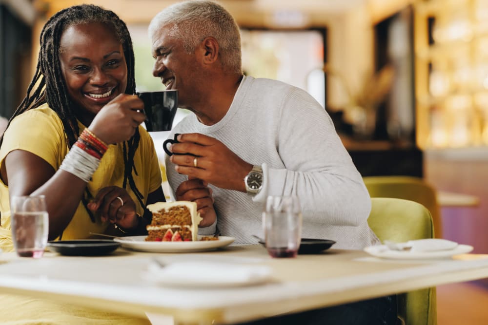 Couple sharing dessert and coffee near Gilfield Park in Charlotte, North Carolina
