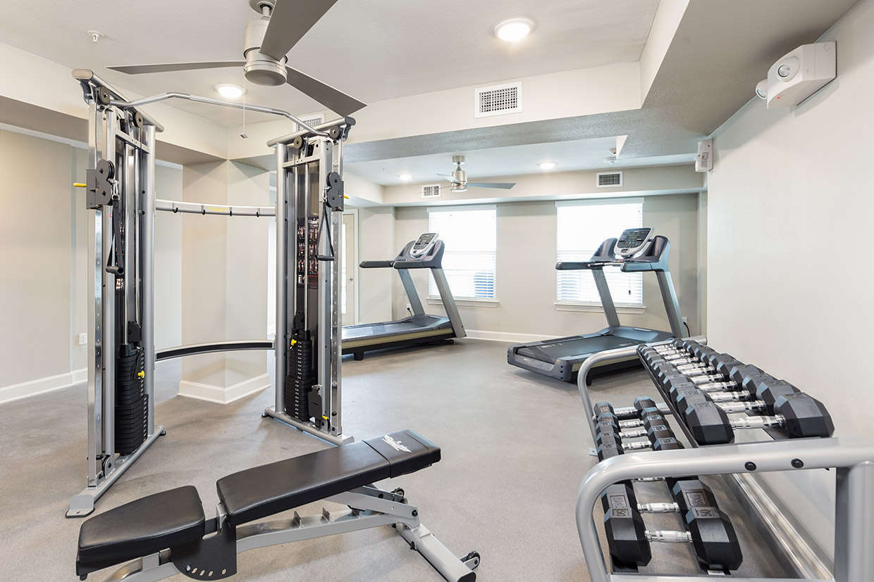 Goodnight Commons fitness center with treadmills, free weights, and cable machine