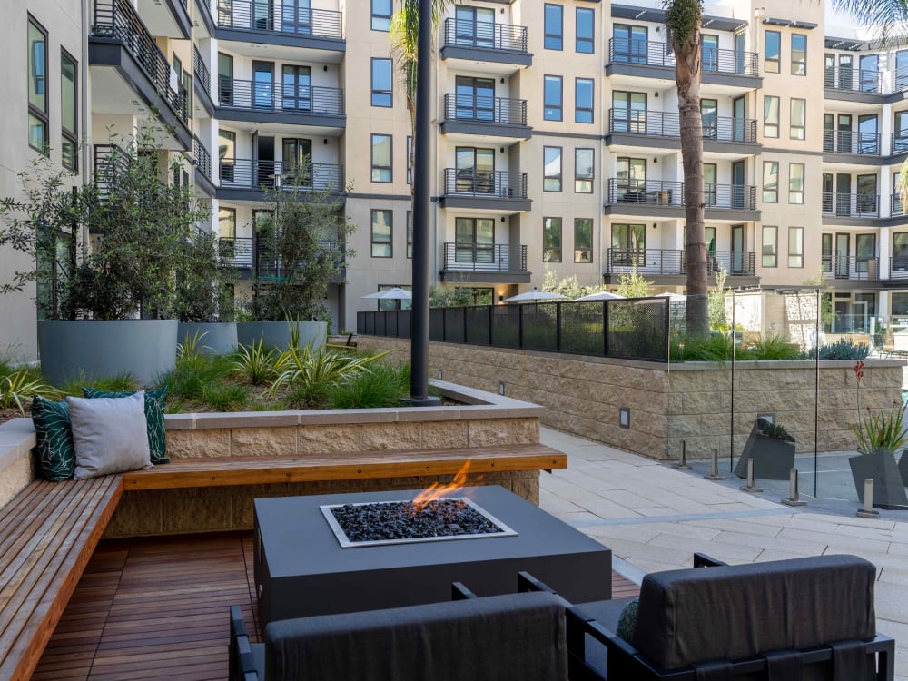 Firepit lounge area in the courtyard at MV Apartments in Mountain View, California
