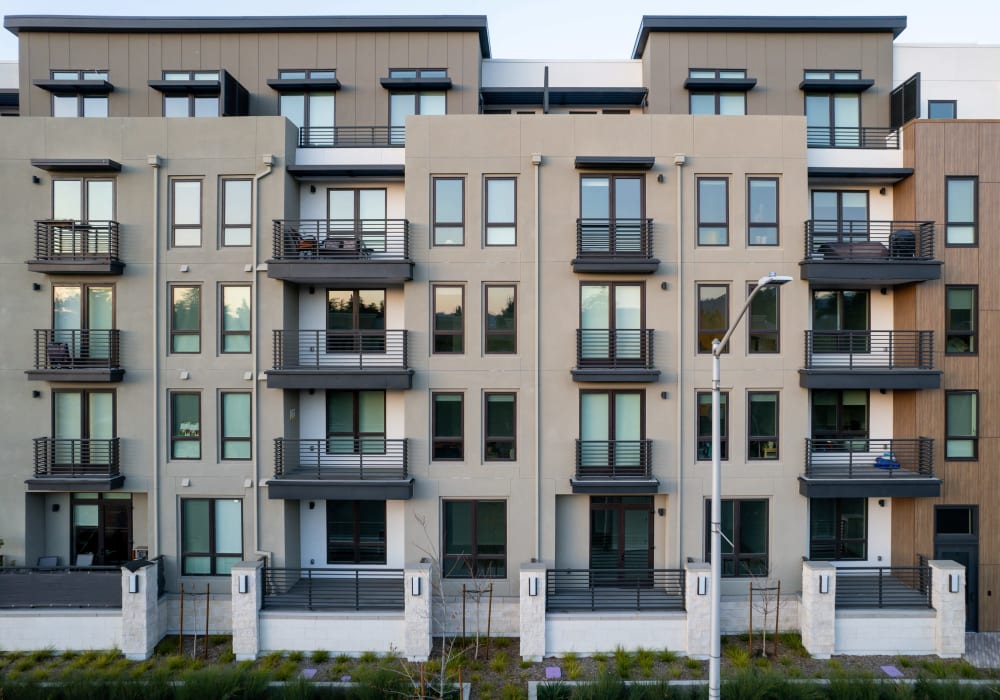 Apartment building exterior at MV Apartments in Mountain View, California