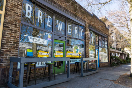 a storefront with a sign that reads brewery