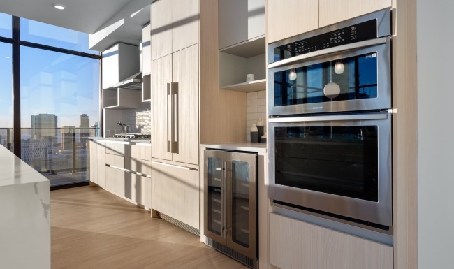 kitchen showing counterspace and bright lighting and modern appliances