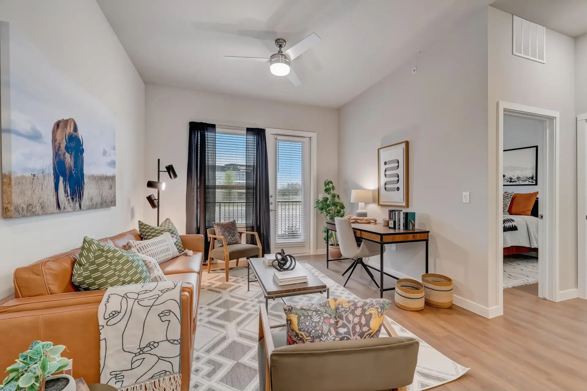 living area at Ascend at the Parkway with a seamless view into a modern kitchen, perfect for easy daily living