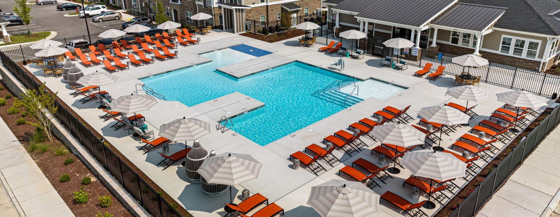 a resort style pool with seating