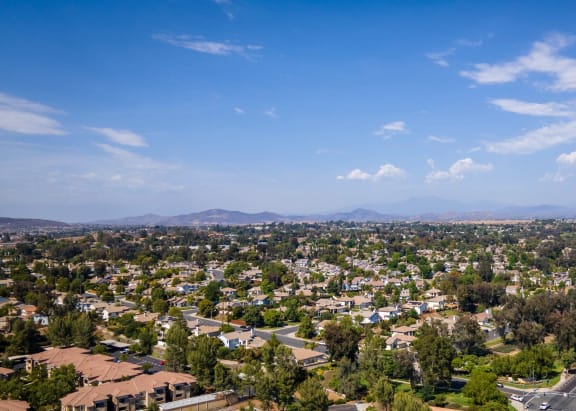 a view of a city from above with the mountains in the distance at Altitude Apartments, Moreno Valley , CA 92553