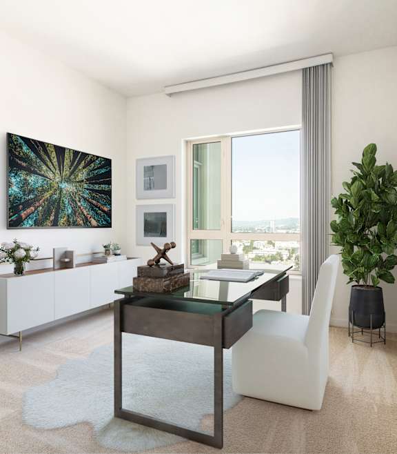 A modern room with a glass table and a white chair.