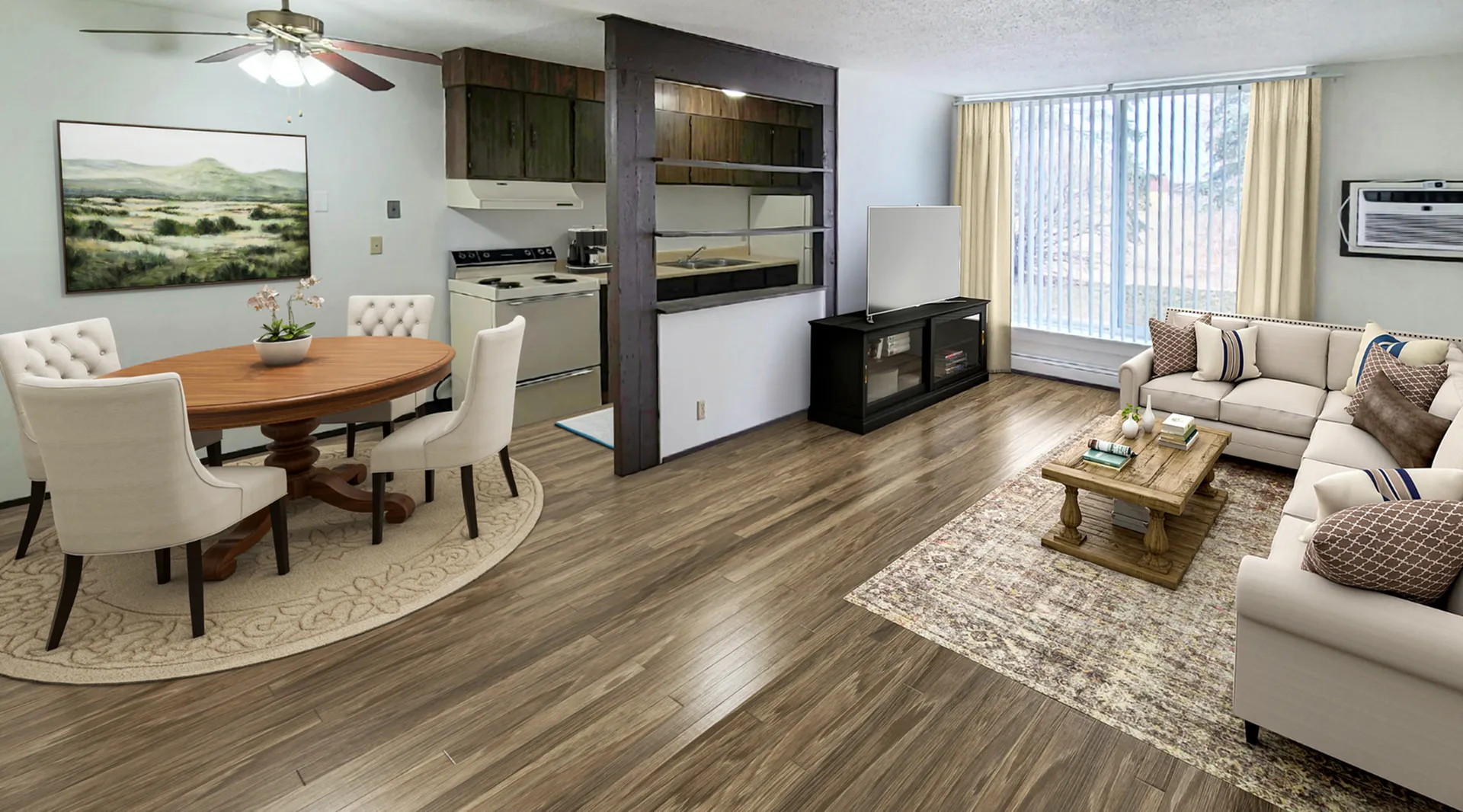 Chic open-plan living room with a cozy sectional sofa, elegant dining area, and modern kitchen, featuring beautiful wooden flooring and expansive windows.