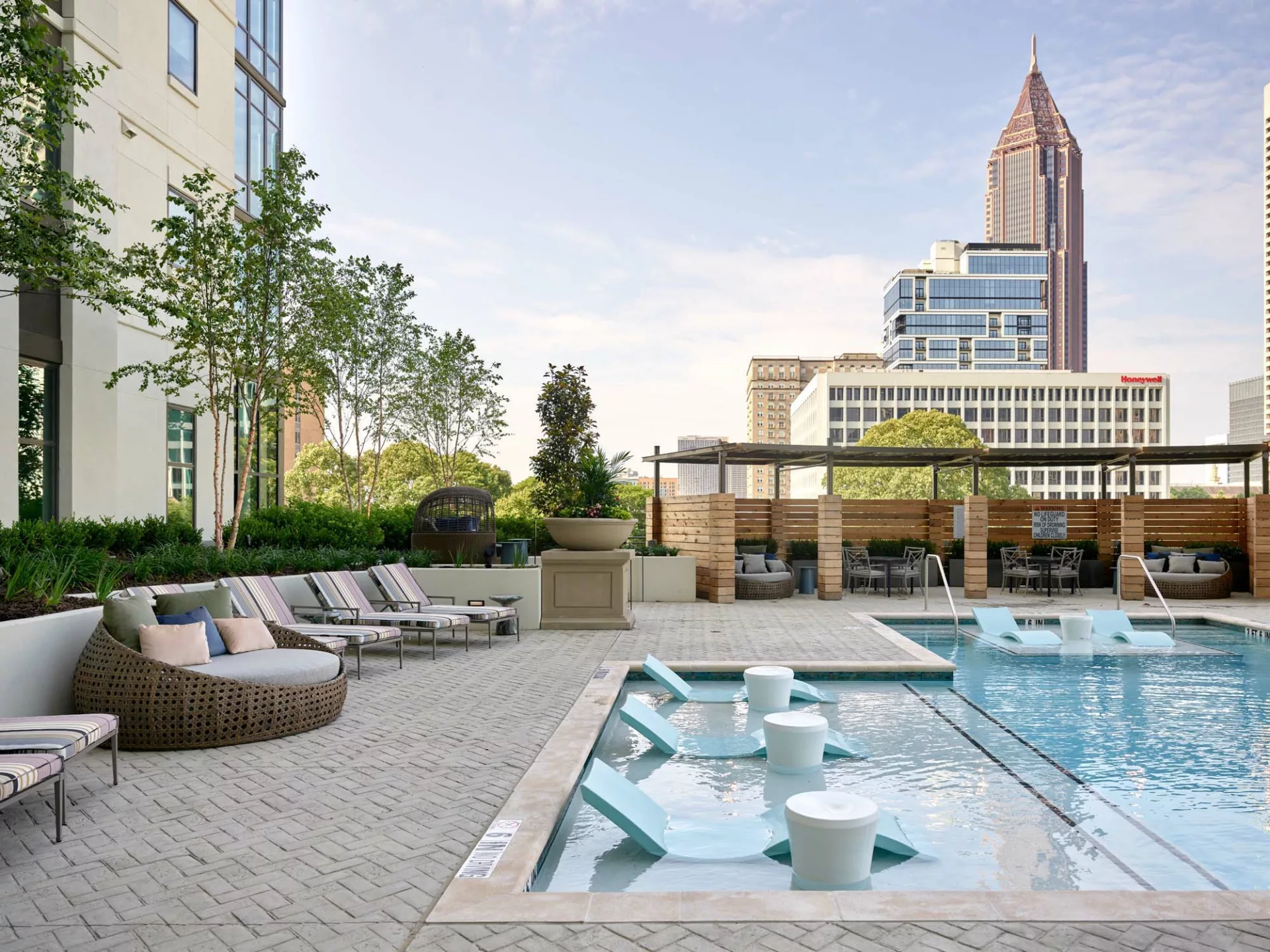 Rooftop pool deck with city skyline view