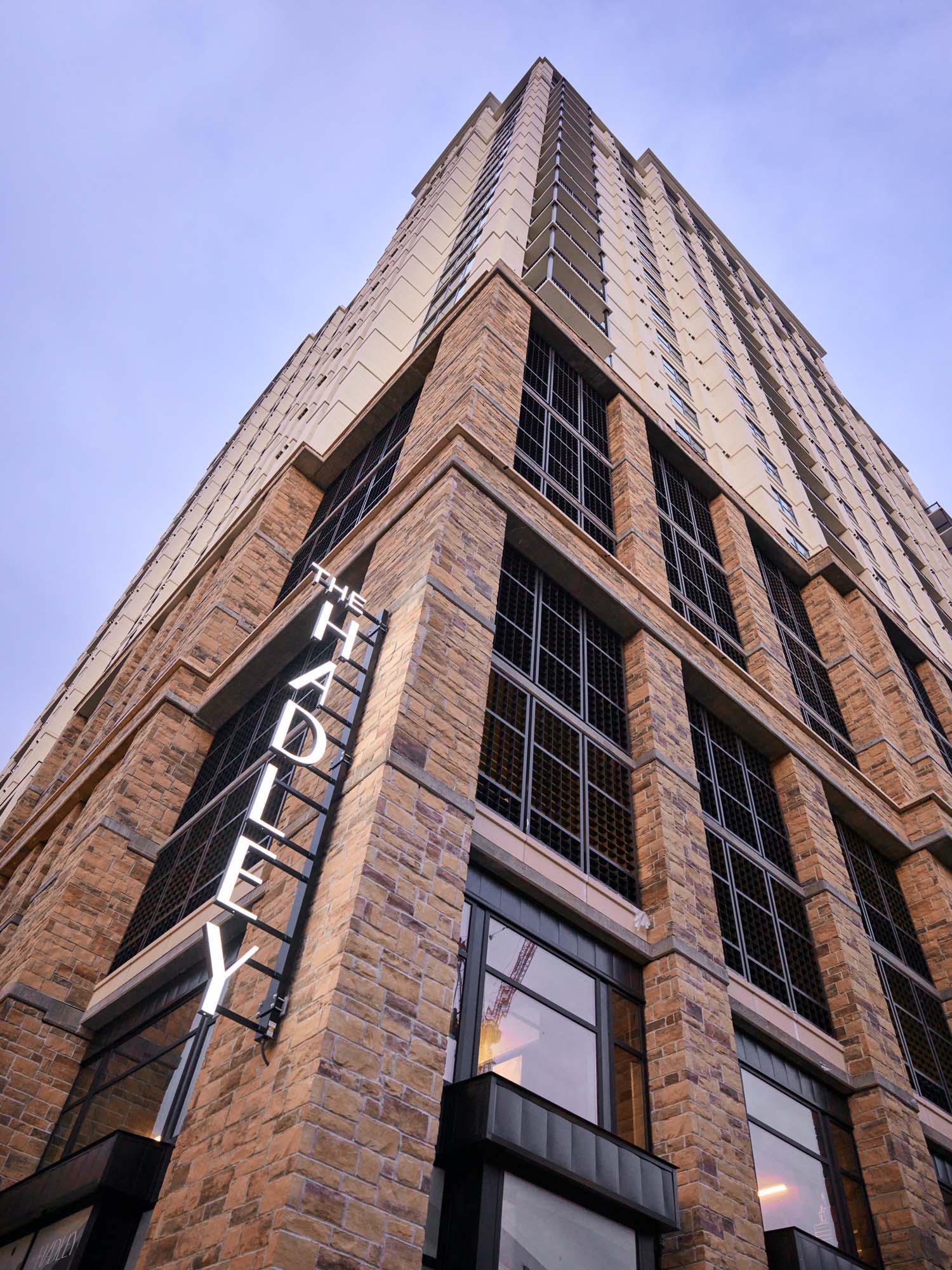 Low-angle view of The Hadley high-rise building
