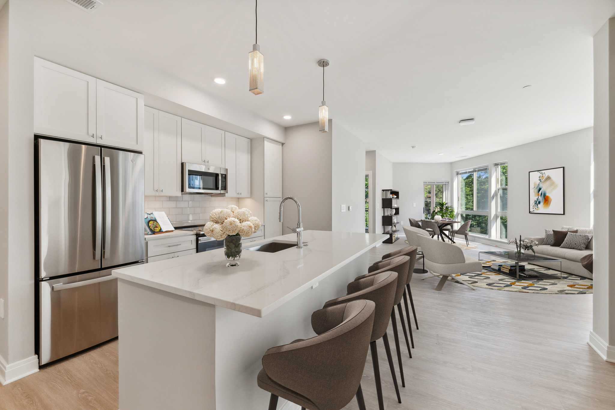 Kitchen, dining area, & living room in Atwell's luxury apartments in Silver Spring, MD