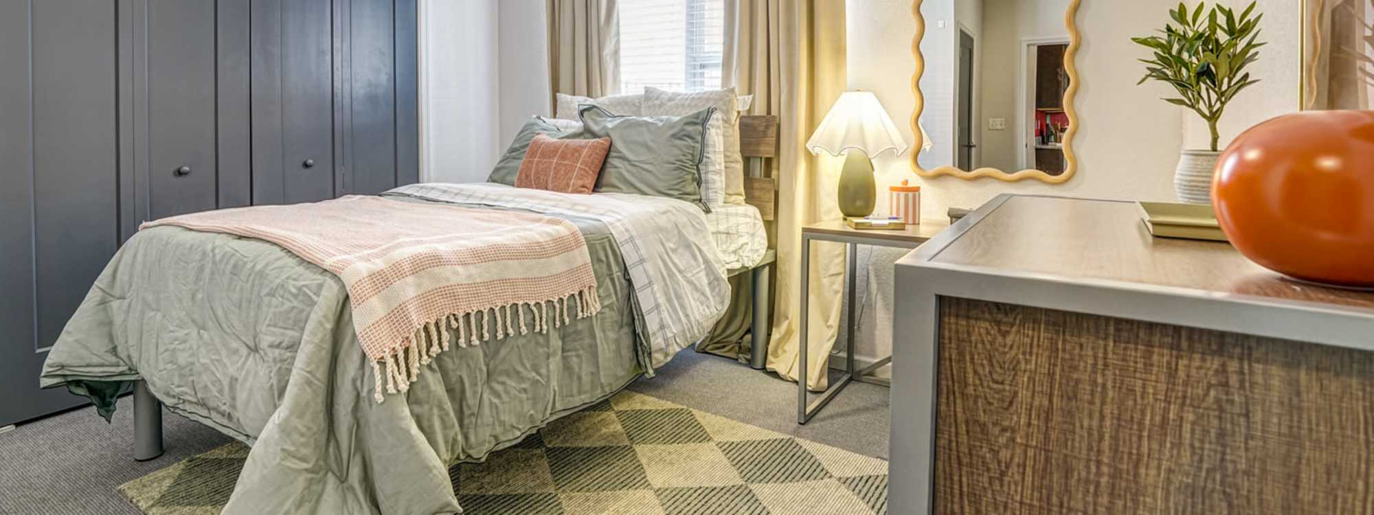 Bedroom in a student living at The Nine in Louisville, Kentucky