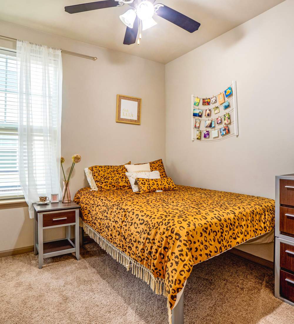 Private bedroom at The Den in Columbia, Missouri