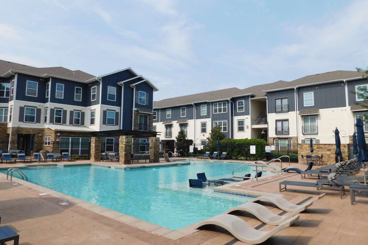 Apartments swimming pool at The Den in Columbia, Missouri