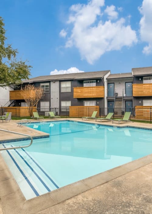 Swimming pool at Emmitt Luxury Apartments in Haltom City, Texas