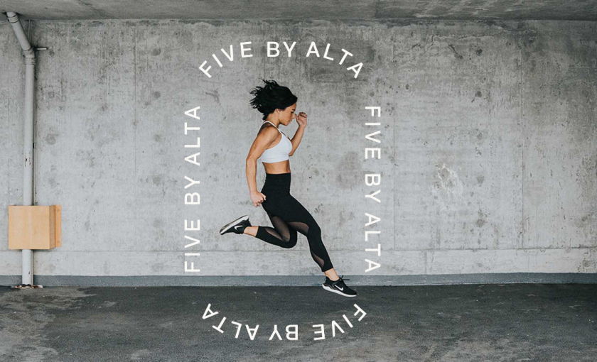 exercising woman caught jumping in mid-air