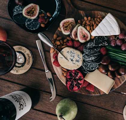 a plate of food on a wooden table