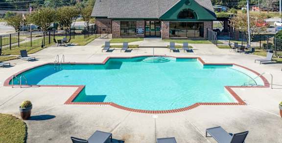 Pool With Relaxing Chairs at Channing, Fayetteville, North Carolina