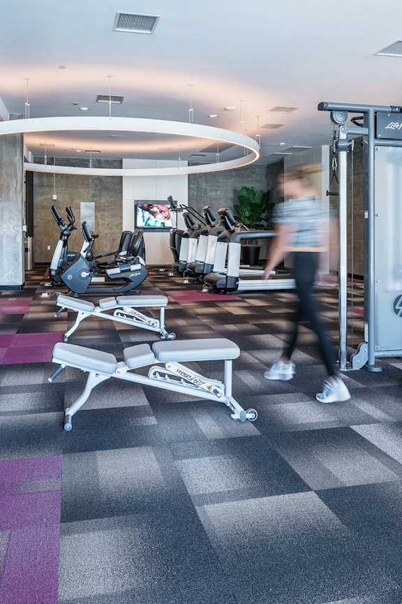 Exercise Room Weight Rack at G12 Apartments, Los Angeles, CA, 90015