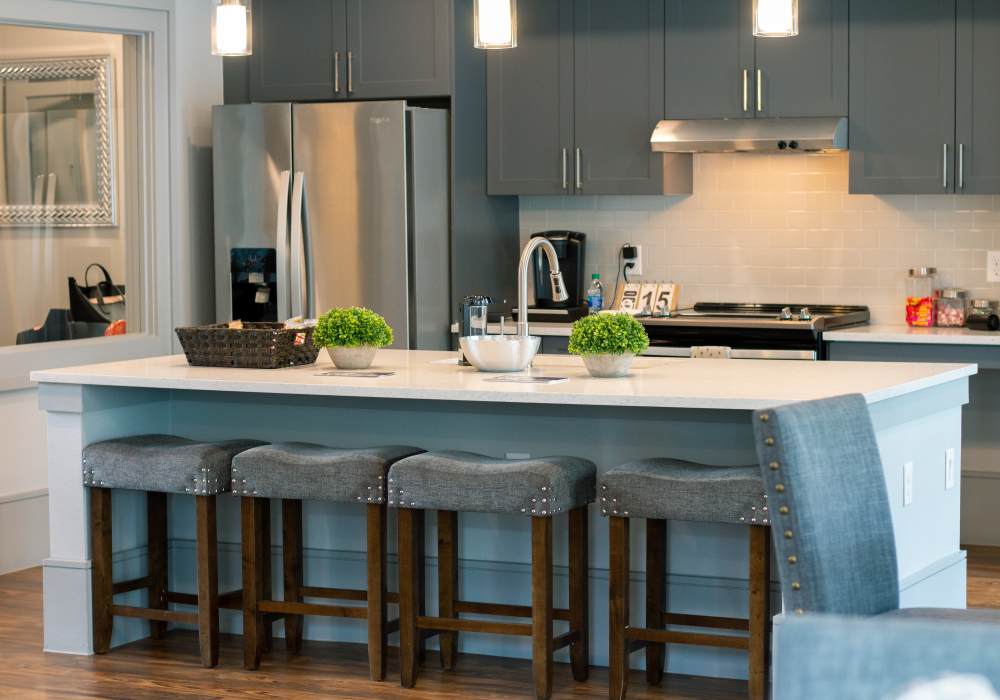Kitchen with island at Southfork Lake in Manvel, Texas