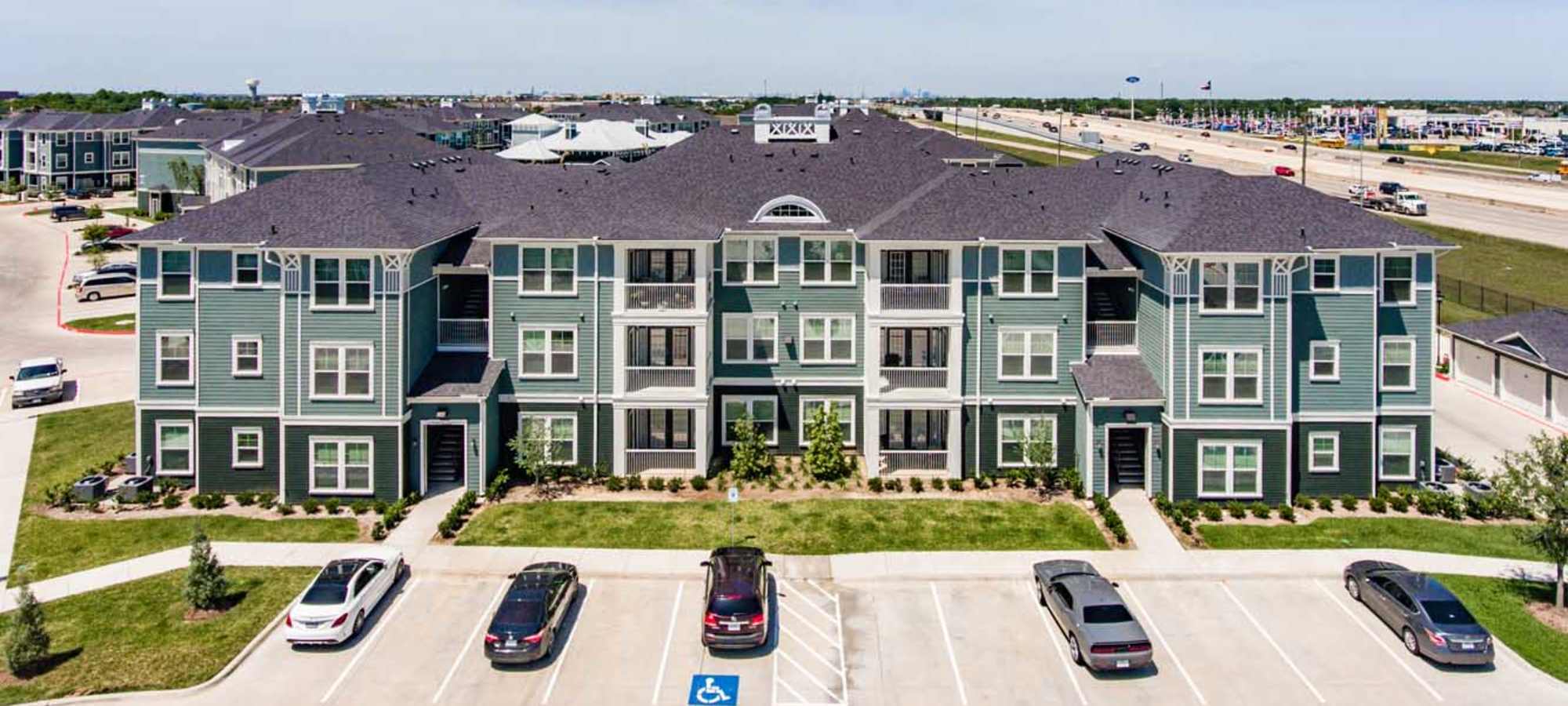 Apartment exterior view at Southfork Lake in Manvel, Texas