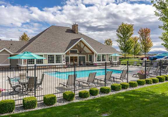 A house with a pool in the backyard.