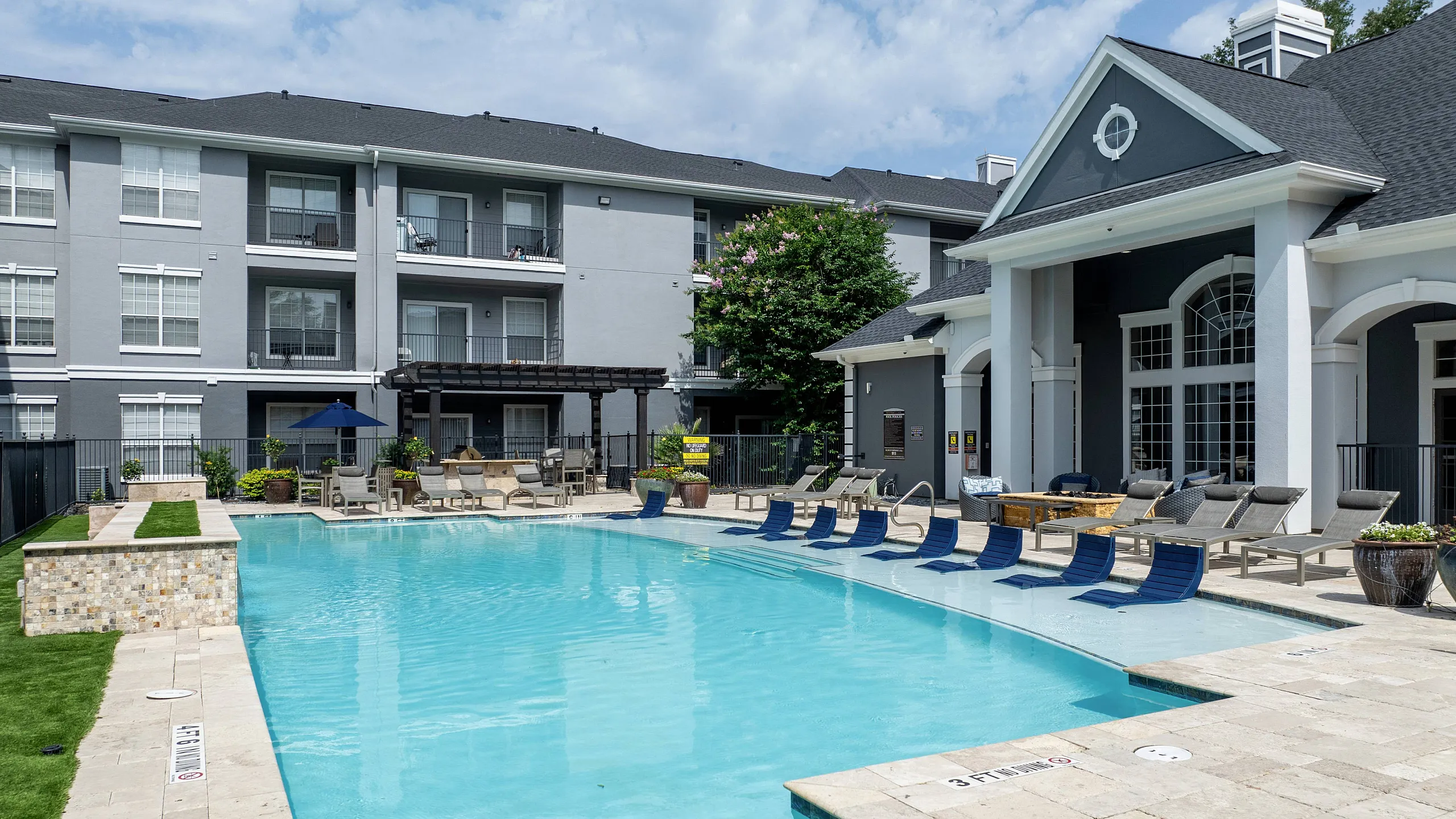 Sparkiling pool with lounge seating
