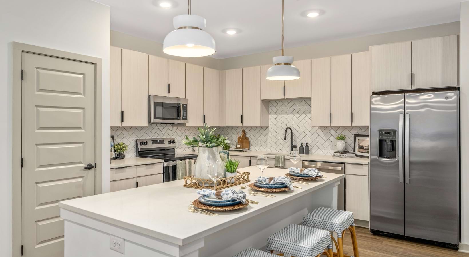 Modern kitchen with stainless steel appliances Portier Midtown Mobile, Al