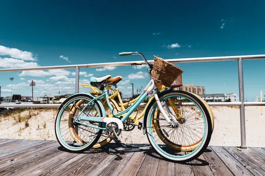 Bike on boardwalk by the ocean.